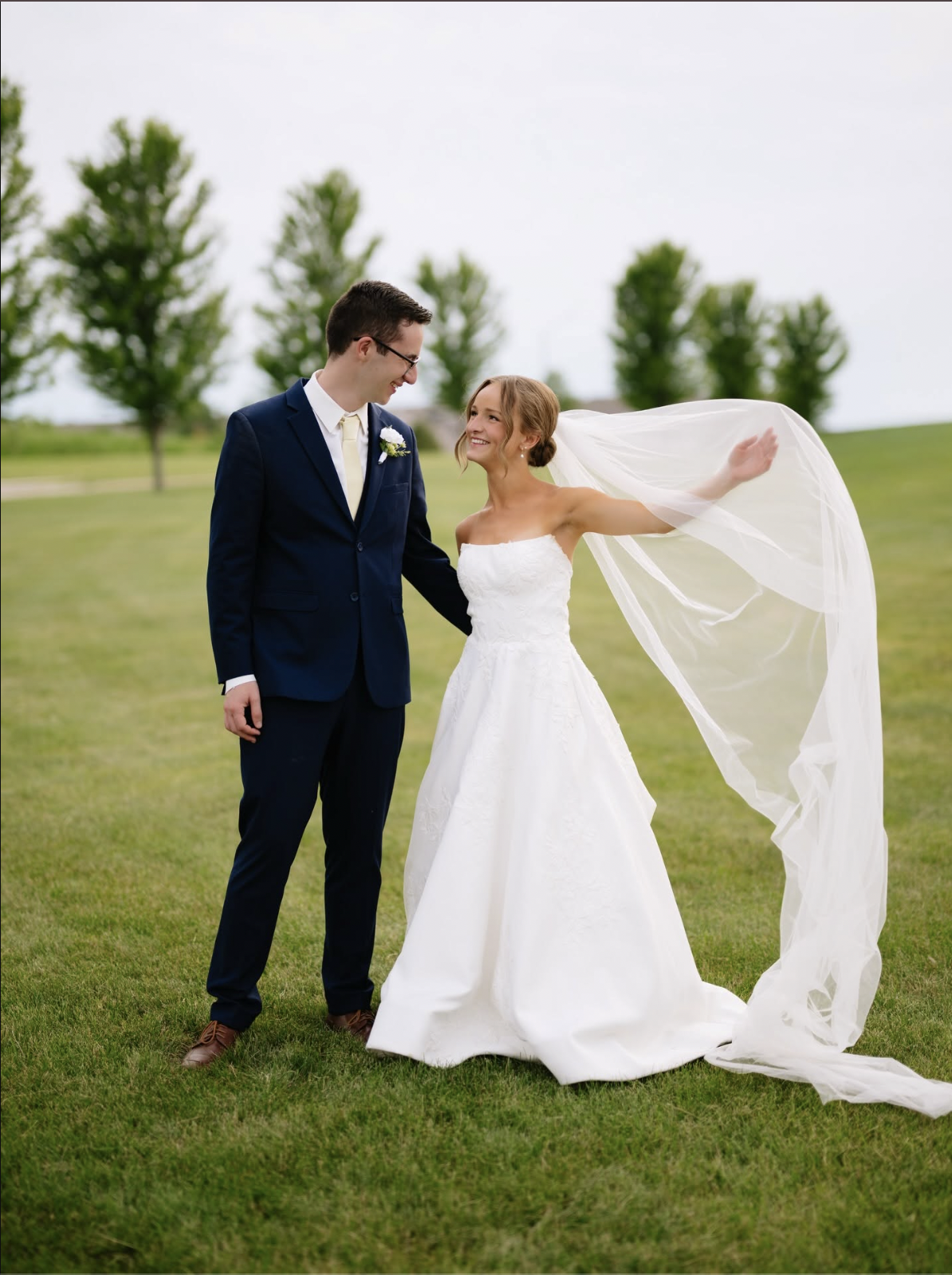 Couple wearing a white gown and a black suit
